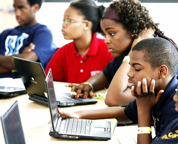 Teacher, student and developer collaborating